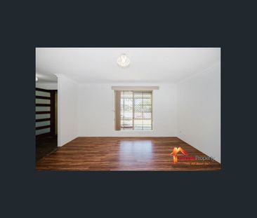 Spacious 4 Bedroom, 2 Bathroom Home in a Prime Location! - Photo 1