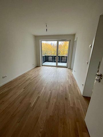 KfW 40-Neubau-Wohnung mit EBK, Balkon, Echtholzparkett, HWR, Fahrstuhl, Tiefgarage - Foto 5