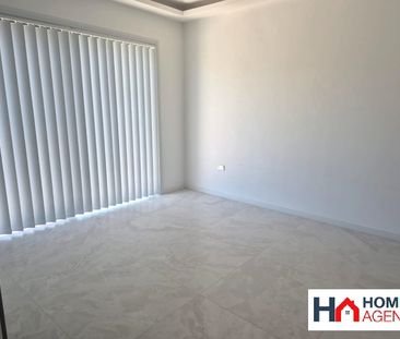 FULLY RENOVATED 4 BEDROOM HALF HOUSE (Top Level) - Photo 1