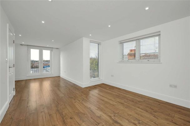 Four-bedroom home set on a private road, offering a harmonious blend of period character and contemporary style. Located within easy reach of local amenities, and excellent transport links. - Photo 1