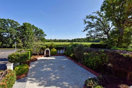 A modern and detached family home with ample parking and views over Crown land. - Photo 5