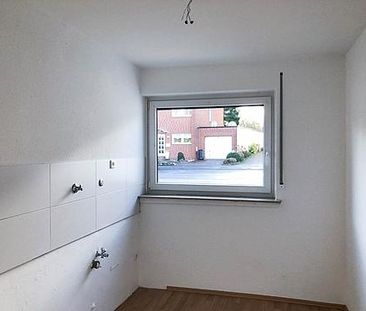 Gut geschnittene EG Wohnung mit Balkon und Garage - Foto 1