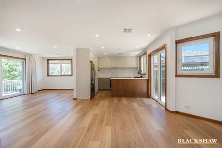 A Renovated 4-Bedroom Gem with Endless Potential - Photo 3