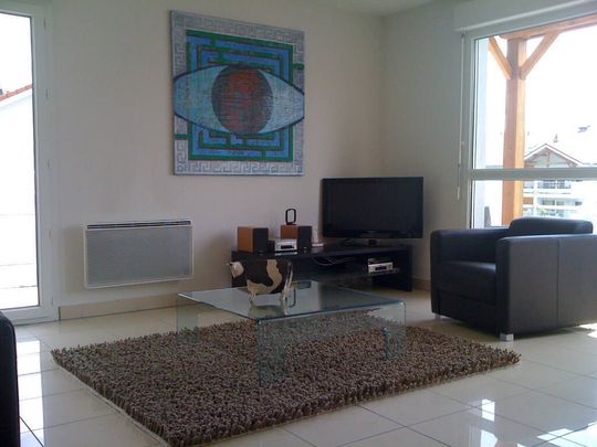 Location appartement 3 pièces 57.2 m² à Saint-Genis-Pouilly (01630) - Photo 1