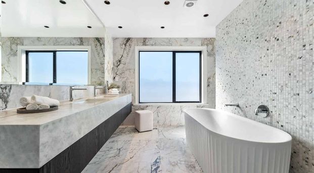 Stunning 5BR Wainui Oasis w/ Pool - Photo 1