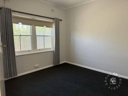 Character Bungalow with Ample Shedding - Photo 5