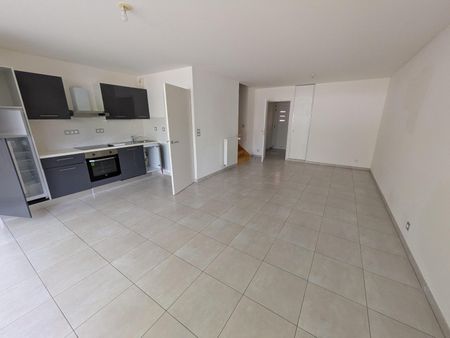Location Maison 4 pièces 91m² CARQUEFOU 44470 - Photo 2