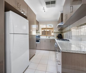 Neat, Tidy & Centrally Located – The Perfect Low-Maintenance Home - Photo 6