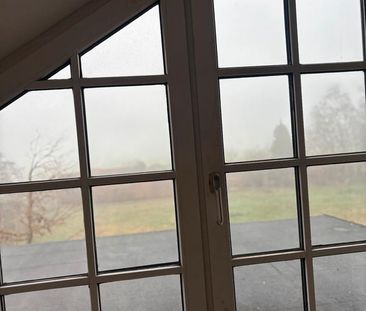 Renovierte zwei Zimmer DG- Wohnung mit traumhaft schönen Ausblick - Foto 1