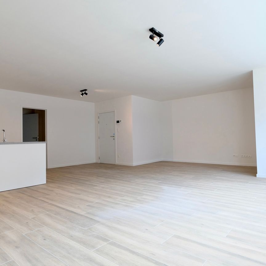 Gelijkvloers nieuwbouwappartement met tuin - Photo 1