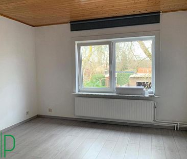 Ruim gelijkvloersappartement met tuin en garage in Mol-Millegem. - Photo 1