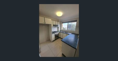 Neat, Spacious two bedroom unit - Photo 2