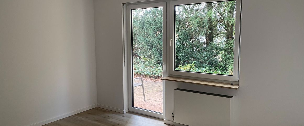 Moderne, gepflegte Wohnung mit Garten und Garage in erstklassiger Lage - Foto 1