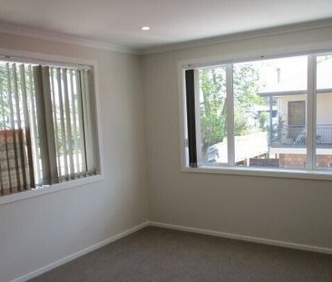 This beautifully designed three-bedroom, two-bathroom townhouse off... - Photo 3