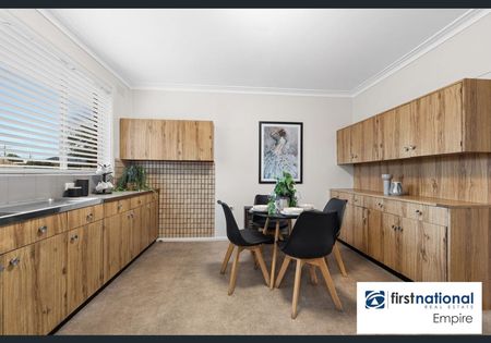 Spacious Three-Bedroom Unit - Photo 4