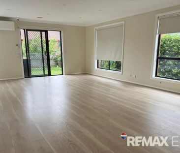 “Family Comfort and Contemporary Style in a Sought-After Location” - Photo 2