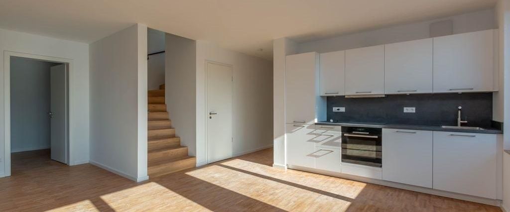 Großzügige Neubauwohnung mit Dachterrasse - Foto 1