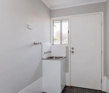 Three Bedroom Two Bathrooms In Wanted Locale - Photo 1