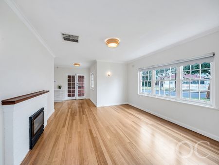 Open the Door to Classic Comfort Just Steps from the Coast - Photo 2