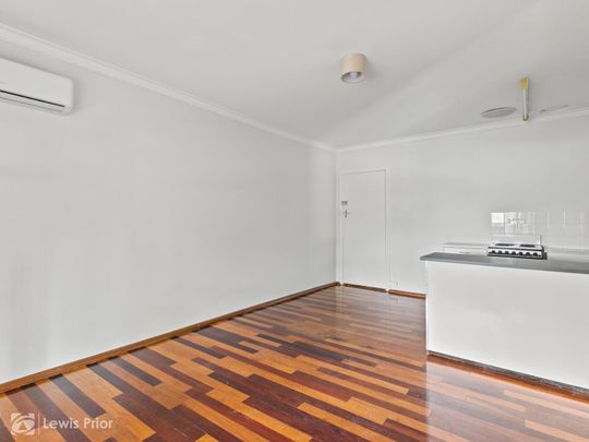 Affordable Neat & Tidy Unit Located Close to the CBD - Photo 1