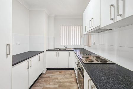 RENOVATED 2 BEDROOM UNIT WITH SPLIT AIR CONDITIONER - Photo 2