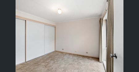 Two-Bedroom Townhouse with Tranquil Garden Setting - Photo 3