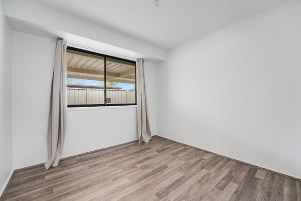 Four Bedroom Home with Spacious Entertaining Area - Photo 1