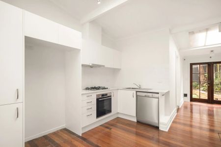 This beautifully renovated tri-level Victorian terrace home, has a sun drenched, landscaped garden incorporating an entertaining deck. - Photo 4