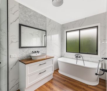 Quality Four-Bedroom Home with Flexible Living - Photo 4