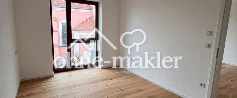 Erstbezug: Moderne 2-Zimmer-Wohnung mit Balkon und EBK zentral in Gangkofen - Foto 1