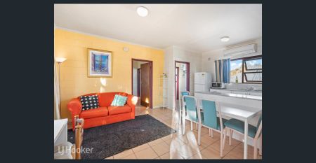 One Bedroom Upstairs Unit In Prime Location - Photo 2