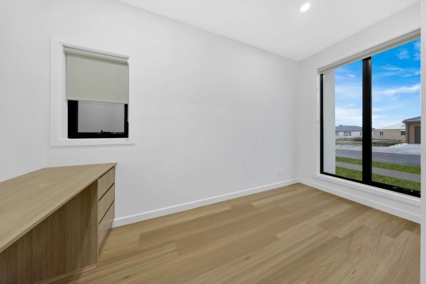 BRAND NEW LUXURY LIVING IN DEVELOPING ESTATE OF WOLLERT - Photo 1