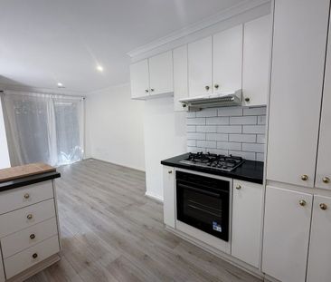 Stylish, Low-Maintenance Living in Prime Location - Photo 2