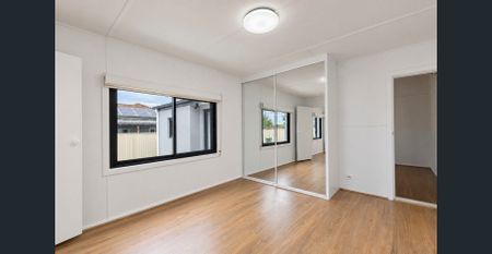 SPACIOUS, FRESHLY RENOVATED FOUR-BEDROOM FAMILY HOME ! - Photo 4