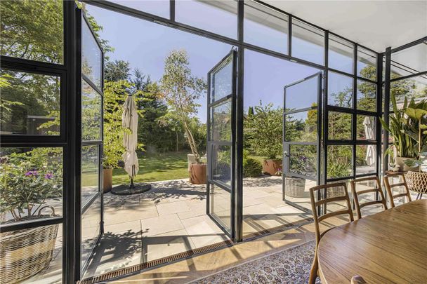 An exceptional period residence with contemporary extension in a prime Hale location. - Photo 1