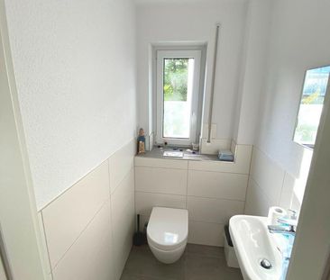 Lichtdurchflutete Erdgeschosswohnung mit Terrasse und Garten - Foto 5