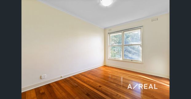 Convenient and Comfortable Living in Prime Location - Photo 1