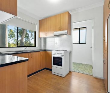 Large 2 Bedroom Unit with Lock-Up Garage - Photo 3