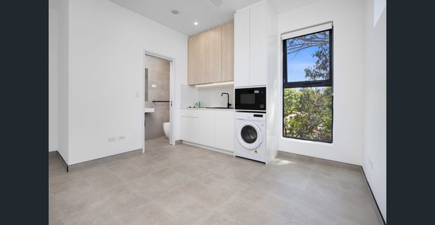 STUNNING MODERN FURNISHED STUDIO APARTMENT - Photo 1