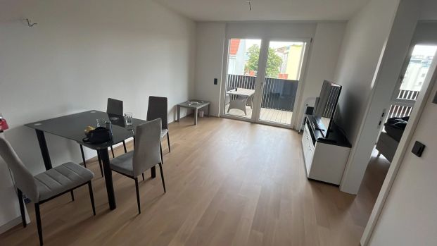 Pauschalmiete inklusive Warmwasser, Heizung & Kühlung - Moderne 2-Zimmer-Wohnung mit großzügigem Balkon und stilvoller Ausstattung - Foto 1