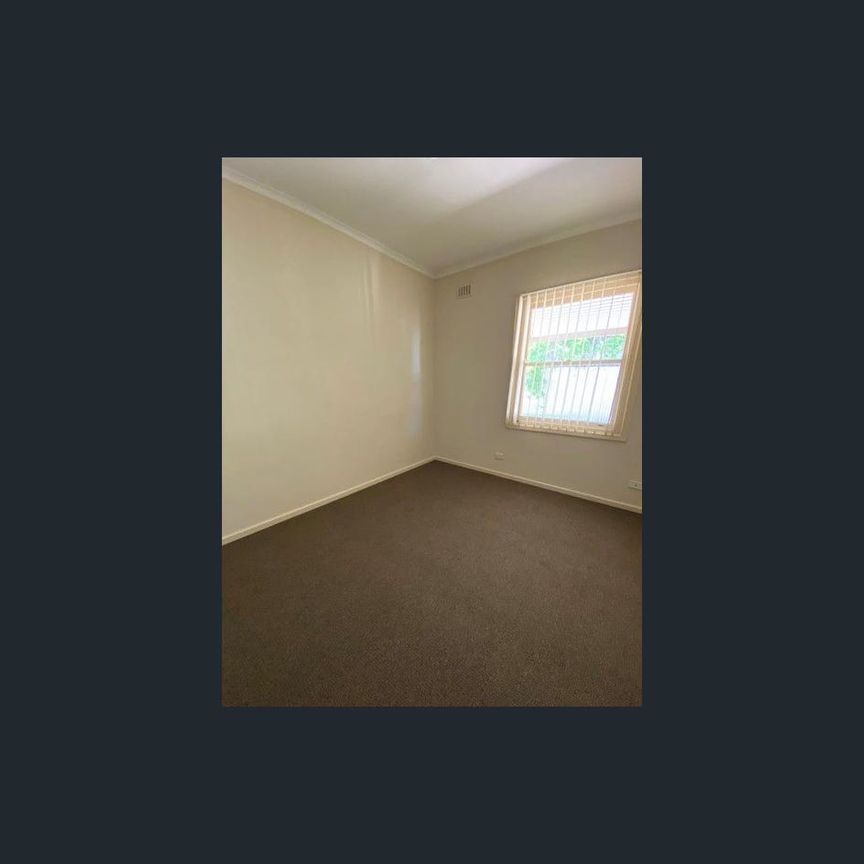 Charming 3-Bedroom Home with Large Yards in Prime Location - Photo 1