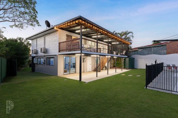 Tastefully Renovated Split-Level Home with Pool in a Quiet Everton Hills Cul-de-Sac - Photo 1