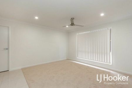 Modern Family Home with Stylish Finishes & Low-Maintenance Living - Photo 2