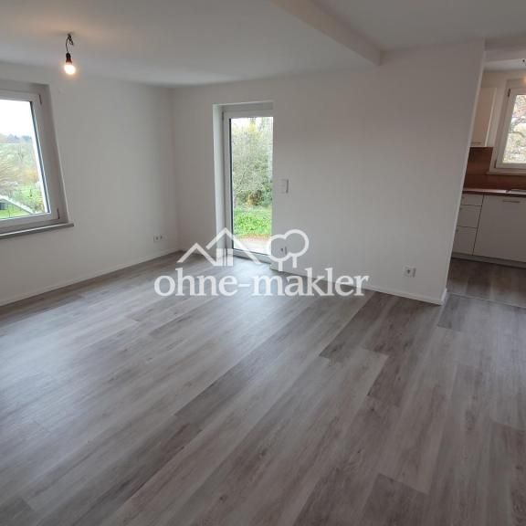 Kernsanierte Wohnung in Dorfmitte mit hochwertigem Ausbaustandard und großer Dachterrasse - Foto 1