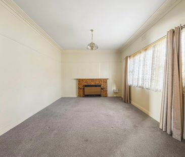 EXCELLENT HOME IN GREAT LOCATION WITH LARGE YARD - Photo 1