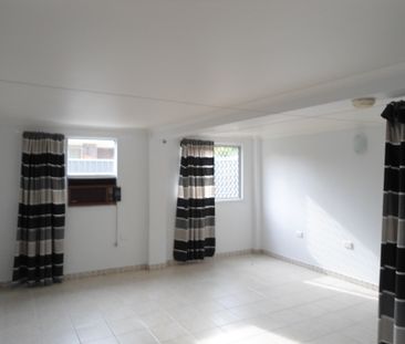 Low-Maintenance Living with Private Courtyard & Water Included - Photo 1