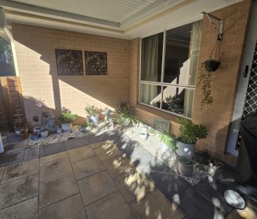 Spacious Four-Bedroom Home with Solar, Double Garage & Gardens - Photo 3