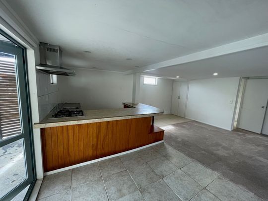 Coastal Comfort - 3-Bedroom Downstairs Unit - Photo 1
