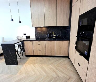 Apartament z balkonem z widokiem na rzekę. - Фото 1