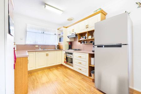 NEAT & TIDY THREE BEDROOM HOME - Photo 2
